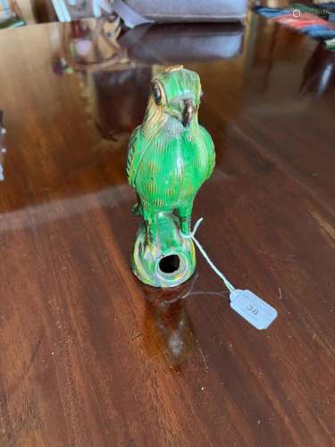 A Chinese green glazed stone-ware parrot 21cm high