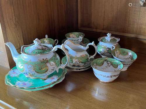 A Coalport green banded and gilded part tea-service, English...