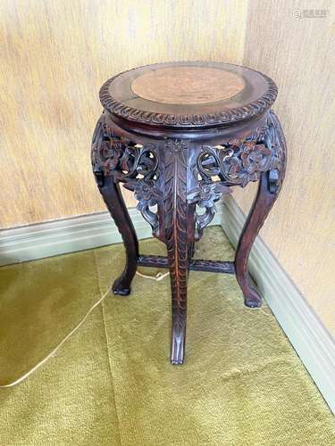 A Chinese carved hardwood and rouge marble jardinière stand,...