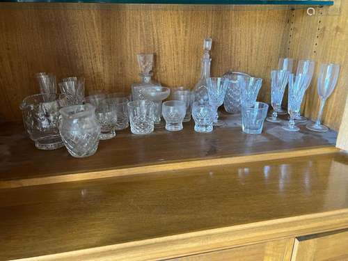 A collection of various cut glass drinking glasses and jugs ...