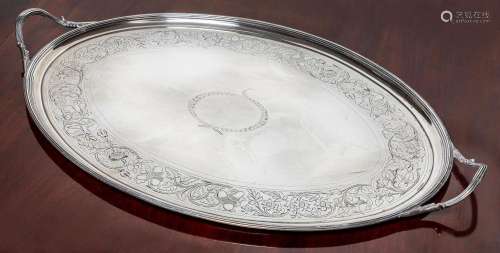 A large George III sterling silver oval tea-tray, makers mar...