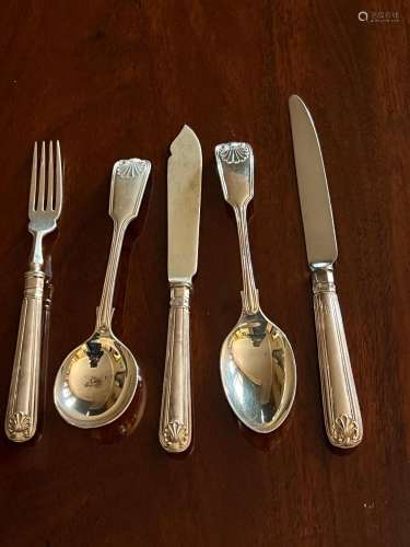 A silver Old-English double-struck shell pattern cutlery ser...