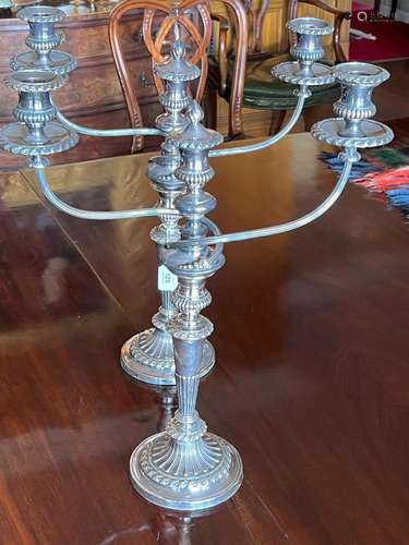 A pair of George IV Sheffield-plate table candlesticks, Engl...