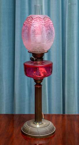 A Victorian ruby glass and brass oil lamp,English circa 1870...