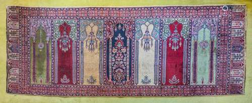 A Kayseri 'saf' rug, with seven arched niches and ha...