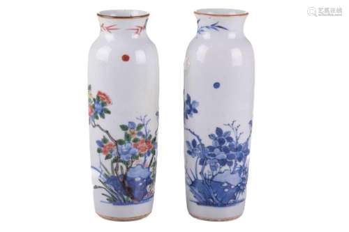 A very close pair of Chinese porcelain vases, Qing, each alm...