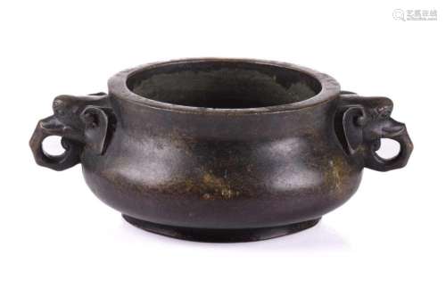 A Chinese bronze censer, with thick walled compressed body, ...