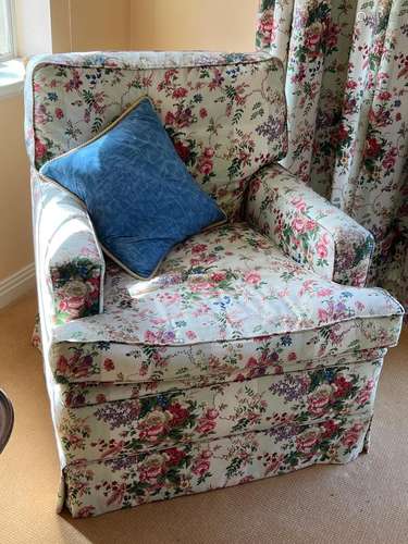 A bedroom armchair covered in floral chintz 83cm high,75cm w...