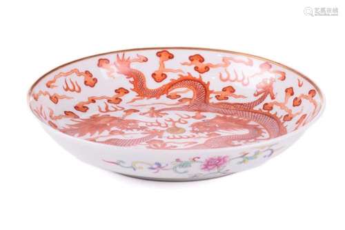 A Chinese porcelain iron red dragon dish, painted with two o...