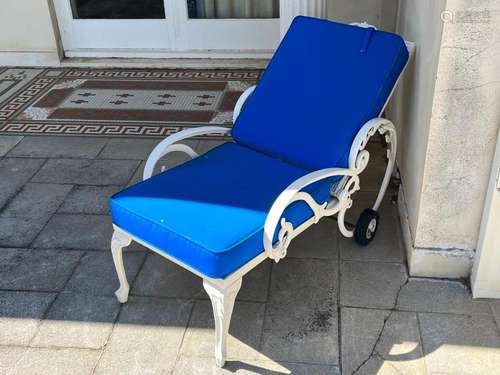 A pair of Italian white painted garden recliner chairs appro...