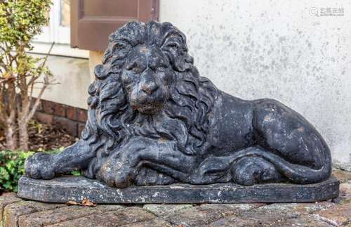 A pair of impressive cast-iron flat back figures of a Unicor...