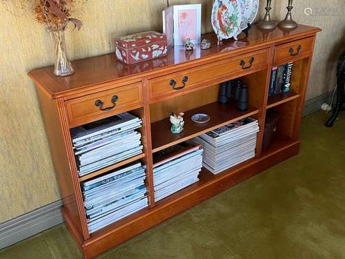 A modern Georgian style open bookcase, with three frieze dra...