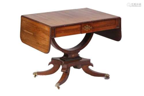 A Regency brass inlaid figured rosewood two-flap sofa table ...