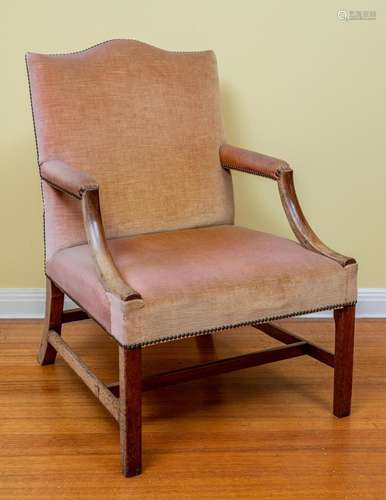 A George III mahogany Gainsborough chair, English circa 1780...