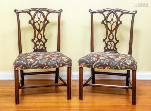 A set of four George III mahogany and tapestry dining chairs...