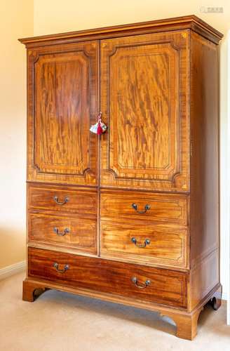 A George III inlaid mahogany linen-press, English circa 1800...