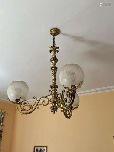 A Victorian brass and etched-glass three branch ceiling ligh...