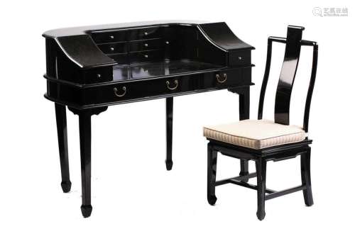 A black lacquered Carlton House-type writing desk, 20th cent...
