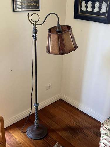 A brass adjustable floor lamp with parchment shade,19th cent...