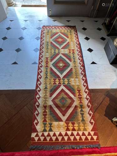 A small kilim runner 203cm by 70cm