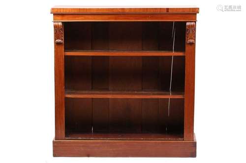 A late Victorian mahogany open bookcase with carved corbels ...