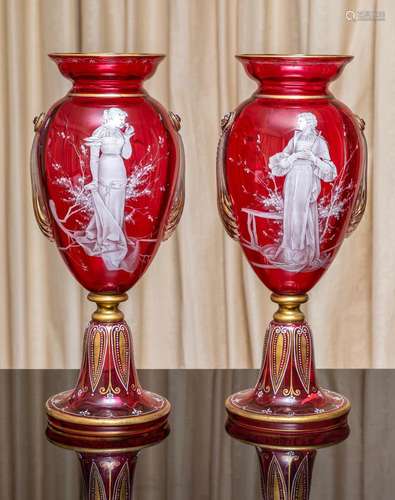 A pair of very impressive Mary Gregory type ruby glass urns,...