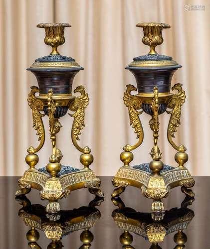 A pair of unusual Neo-classical bronze and gilt-bronze candl...