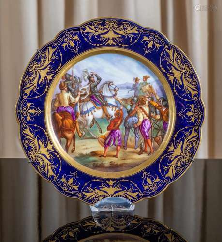 A Sevres pattern porcelain Henry IV subject gilded lobed cir...