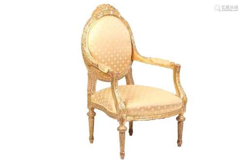 A Louis XVI style carved and giltwood cameo backed fauteuil,...