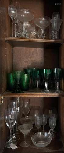 A small collection of Victorian green pony glasses and vario...