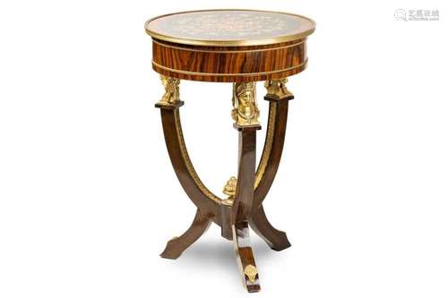 A French Empire-style circular rosewood gueridon table with ...