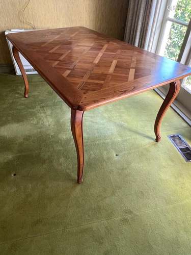 A modern French cherrywood parquetry top finish dining table...