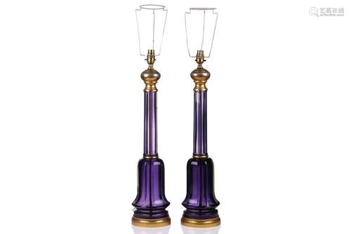 A pair of large Victorian-style amethyst glass and gilt bras...