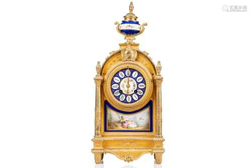 A Louis XVI-style gilt metal cased 8-day mantle clock of arc...