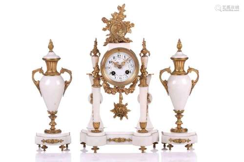 A Louis XVI-style white marble and ormolu 8-day clock garnit...