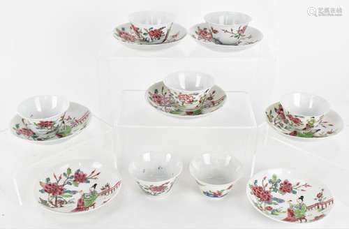 A set of seven Chinese Qing dynasty porcelain cups and sauce...