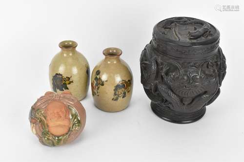 A small collection of Chinese ceramics, comprising a pair of...