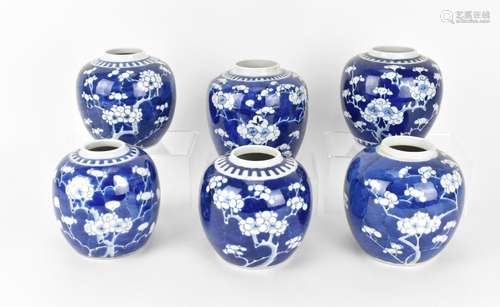 A collection of six Chinese Qing dynasty prunus jars, each o...