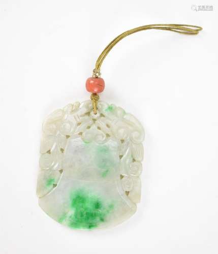 A Chinese carved jade pendant in the form of a bell or archa...