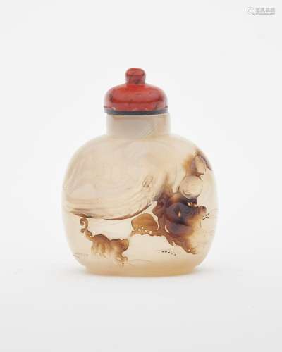 A shadow agate 'child and dog' snuff bottle 19th/ 20th centu...