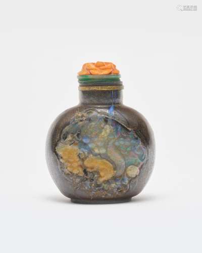 A carved opal 'squirrel and grapes' snuff bottle 20th centur...