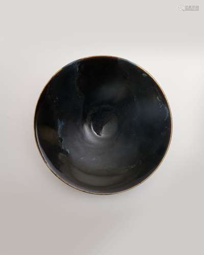 A ding-ware black glazed conical bowl, together with two pie...