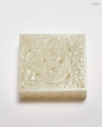 A reticulated white jade 'dragon' covered box 18th century