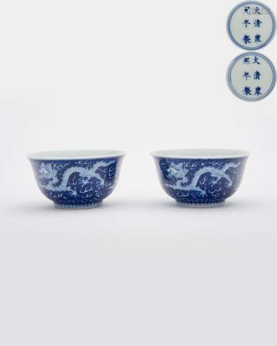 A pair of blue and white 'dragon and cloud' cups Kangxi six-...