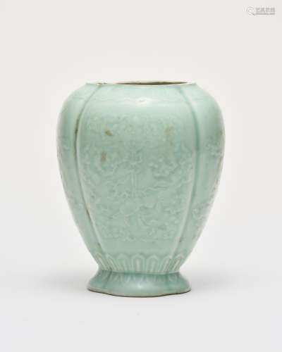 A celaon-glazed four-lobed 'peach and bat' vase Qianlong six...