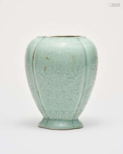 A celaon-glazed four-lobed 'peach and bat' vase Qianlong six...