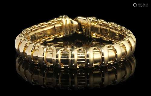 Bracelet souple à maille stylisé<br />
Or 750, L 19,5 cm, 6