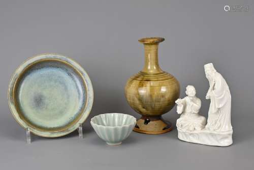 A GROUP OF CHINESE CERAMIC ITEMS. To include a moulded blanc...