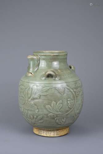 A CHINESE LONGQUAN CELADON GLAZED PITCHER, MING DYNASTY. Hea...