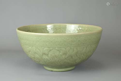 A LARGE CHINESE LONGQUAN TYPE CELADON BOWL. Heavily potted w...